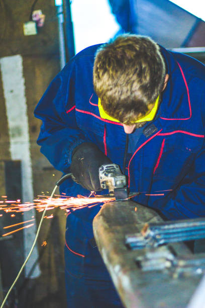 istock Worker Use Electric Grinder Cutting Metal 1155219512