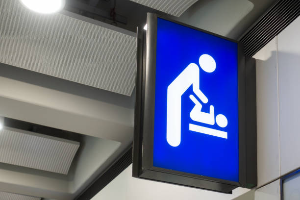 istock Baby changing sign in airport 1155223417