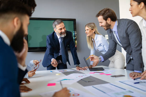 istock Business colleagues working in modern conference room 1155223426