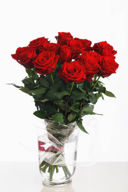 istock red roses bouquet on white background 1155224434
