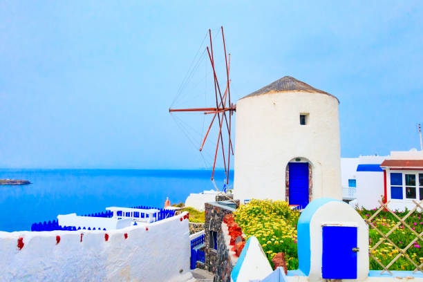 istock Oia windmill in Santorini island in Greece 1155225806