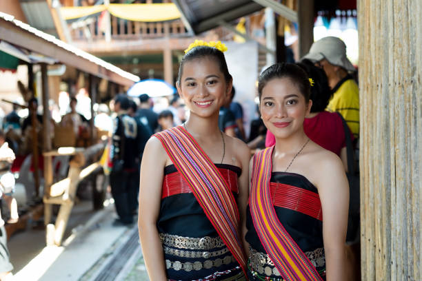 Portrait of Two Beautiful Malaysia Borneo Native Girls in Traditional Costumes Portrait of Kota Belud Kadazan Dusun young girls in traditional attire from Kota Belud district during state level Harvest Festival in KDCA, Kota Kinabalu, Sabah Malaysia. kadazan people stock pictures, royalty-free photos & images