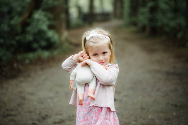 istock Cute little blond girl 1155227427