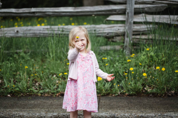 istock Cute little blond girl 1155228411