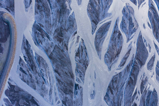 istock Aerial drone view of a huge glacier riverbed, Iceland 1155230074