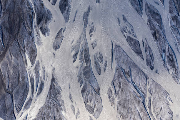 istock Aerial drone view of a huge glacier riverbed, Iceland 1155230084