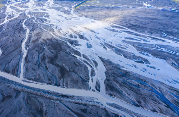 istock Aerial drone view of a huge glacier riverbed, Iceland 1155230113