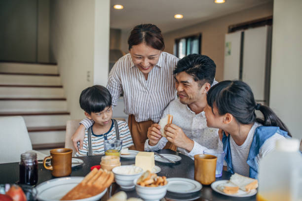 istock Family having meal together 1155235885