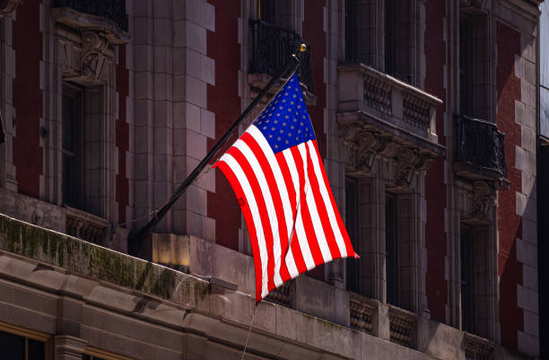 istock American flag in Manhattan New York downtown 1155237830