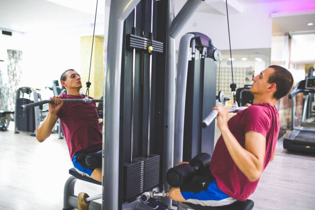 istock Man with prosthetic leg in the gym 1155245285