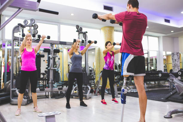 istock Man with prosthetic leg in the gym 1155246427