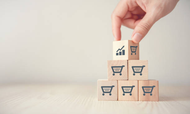 sale volume increase make business grow. sale volume increase make business grow, Flips cube with icon graph and shopping cart symbol. growth in sales stock pictures, royalty-free photos & images