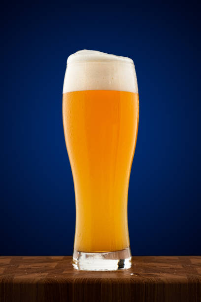 istock misted full cup of cold beer on a wooden table 1155252743