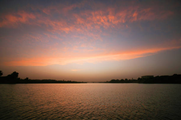 Sunset over the Blue Nile in Khartoum, Sudan. Khartoum is the capital and largest city of Sudan, located at the confluence of the White Nile, flowing north from Lake Victoria in Uganda, and the Blue Nile, flowing west from Ethiopia. Khartoum is composed of 3 cities: Khartoum proper, Khartoum North and Omdurman.