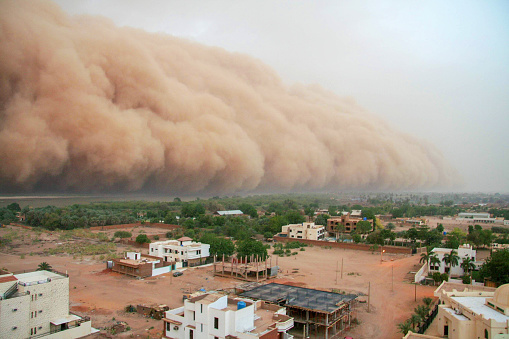 Un haboob (tormenta de polvo del desierto) acercándose A las afueras de Jartum, Sudán photo