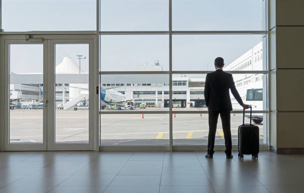 istock Businessman in airport 1155257057