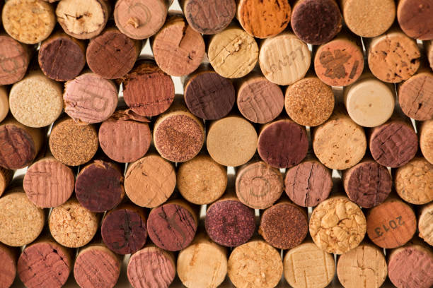 istock Close-up of used wine corks forming a pattern creating an original background. 1155258630
