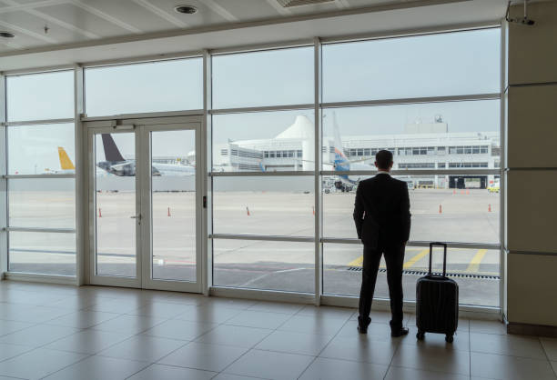 istock Businessman in airport 1155260301