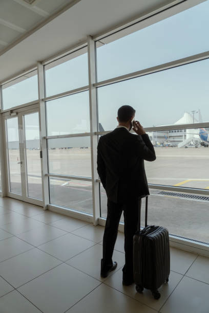 istock Businessman in airport 1155260494