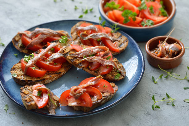 istock Appetizers with anchovy fillets 1155260568