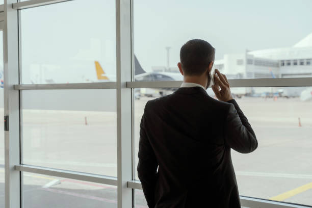 istock Businessman in airport 1155261407