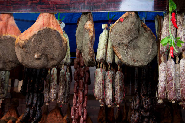 istock smoked meat products. Prosciutto and sausages 1155261896