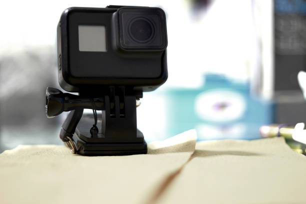 istock Action camera in mount stand clipping clamp on table 1155261913