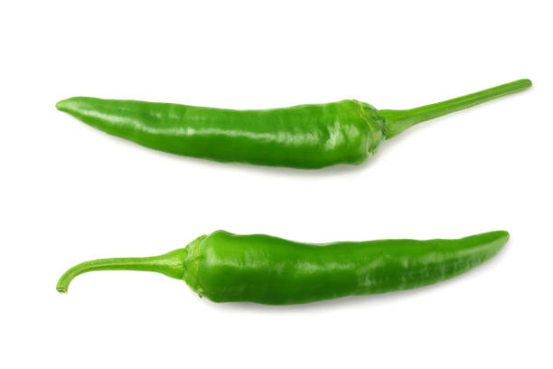 istock green hot chili peppers isolated on white background top view 1155264147