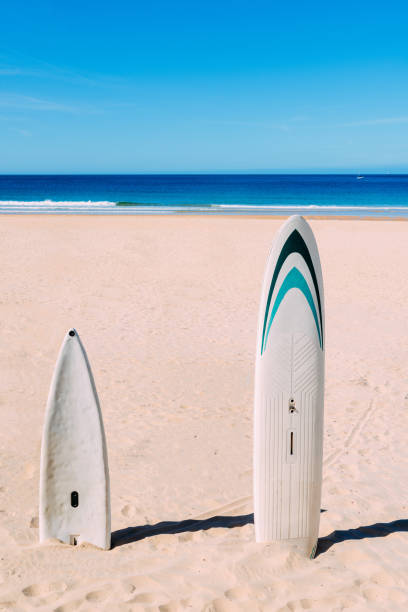 istock Surfboards on empty beach in the summer 1155267822