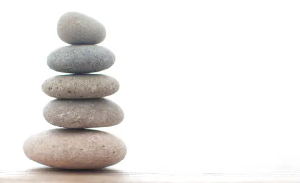 Zen yoga spa stones balanced on one another