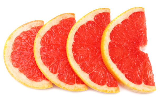 istock healthy food. sliced grapefruit isolated on white background. top view 1155269919