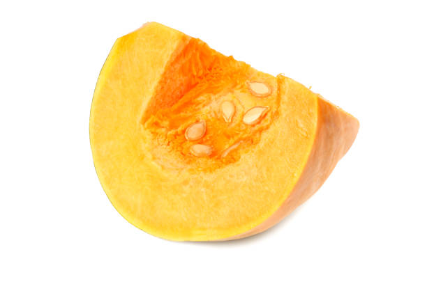 istock piece of pumpkin isolated on white background 1155270284