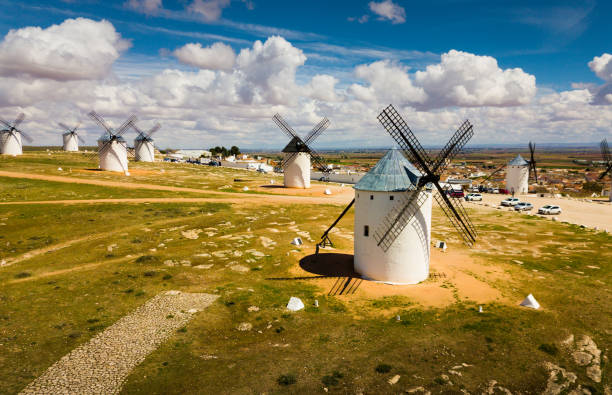 Windmills in Crypta Field Landscape with old spanish windmills in Campo de Criptana campo de criptana stock pictures, royalty-free photos & images