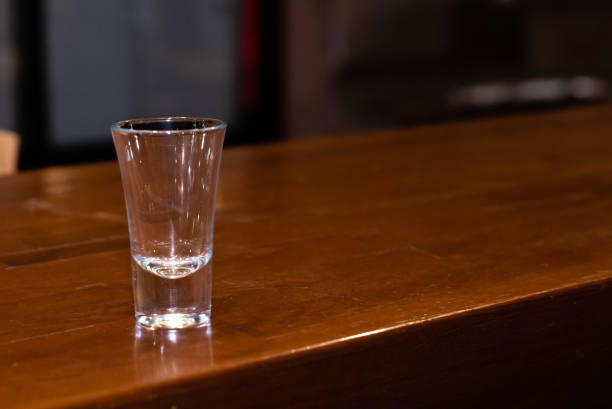 istock empty glass shot glass on the bar 1155271769