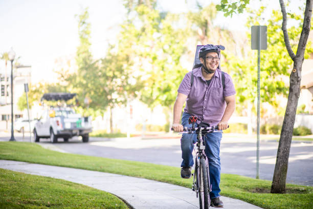 istock Man Delivering Food on Bicycle 1155271844