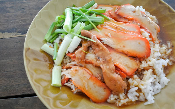 istock Roasted pork with sweet gravy on rice 1155271881