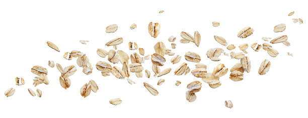 istock Flying oat flakes isolated on white background with clipping path 1155271951