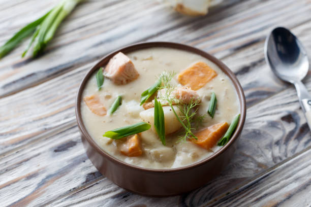 istock Cream soup with salmon and vegetables 1155272791