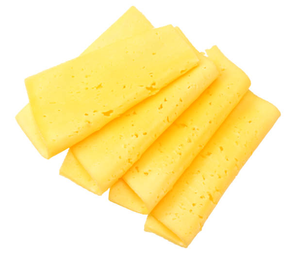 istock cheese slices isolated on white background. top view 1155274371