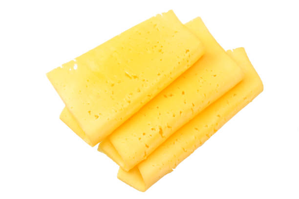 istock cheese slices isolated on white background. top view 1155274372
