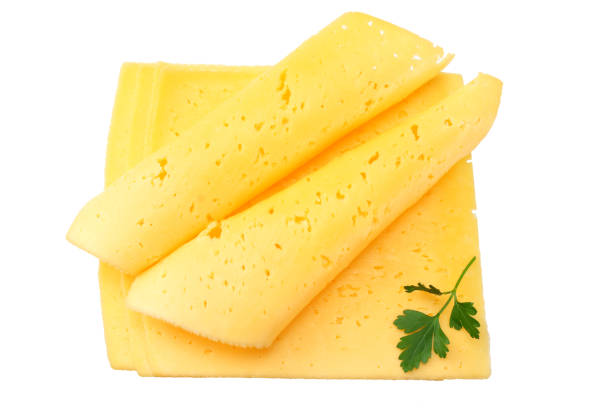 istock cheese slices with parsley isolated on white background. top view 1155274386