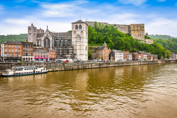Landscape with citadel and fort of Huy, Belgium. Bright and colorful image with citadel of Huy along the Meuse river. A fortress located in the Walloon city of Huy in the province of Liège, Belgian Ardennes, Belgium. liege belgium stock pictures, royalty-free photos & images