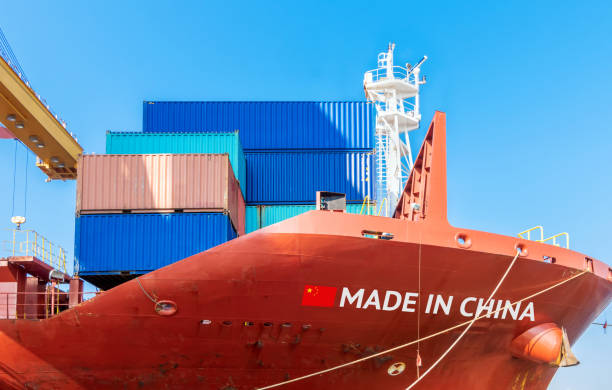 istock Trade war , Made in China smart logistic concept. Shipping Cargo ship business Container import and export company for Logistics and Transportation. Factory move from china. 1155281837