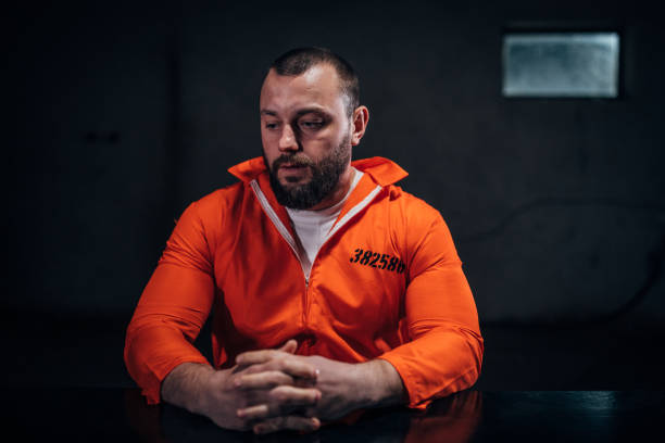 istock Prisoner in the investigation room 1155282407
