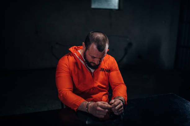 istock Prisoner in the investigation room 1155282434