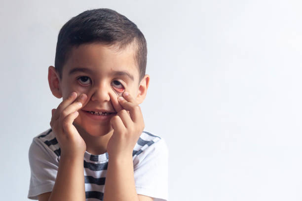 istock Six years boy portrait. Little boy making funny and silly face 1155287632