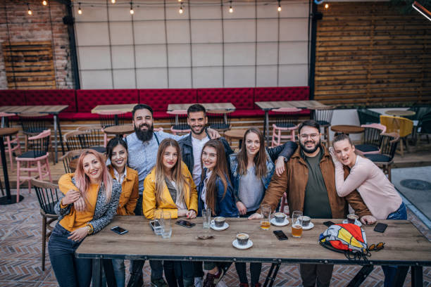 istock Group of young joyful friends portrait 1155289285