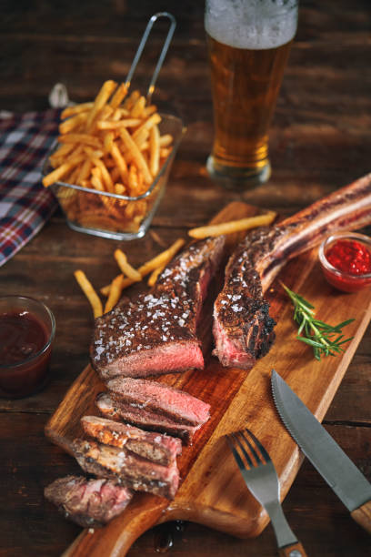 istock Tomahawk Steak with French Fries 1155292333