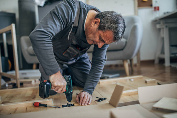istock Senior man assembling furniture 1155292557