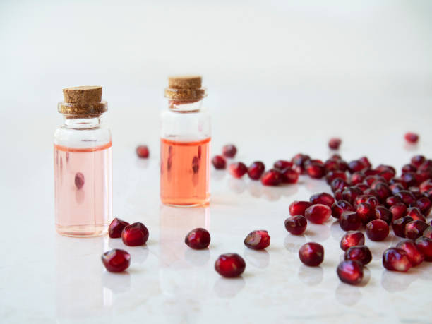 istock Two Bottles of Pomegranate Extract 1155297113